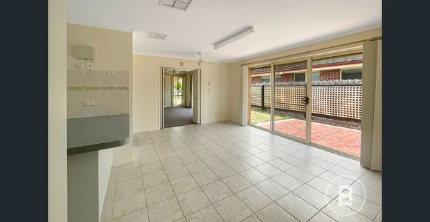 IMMACULATE BRICK HOME WITH SPACE STYLE AND COMFORT - Photo 1