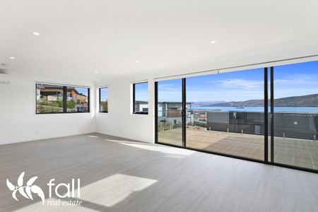 Stylish Three Level Home with Stunning River and Mountain Views in Tranmere - Photo 2