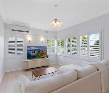 Renovated Cottage in sought after location - Photo 1