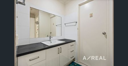 Spacious Three-Bedroom Home in Family Friendly Attwood - Photo 4