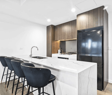 Modern & Stylish Two Bedroom Apartment Located Near All Amenities! - Photo 2