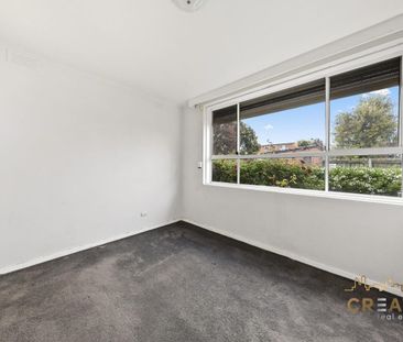 MODERN & CONVENIENT LIVING IN THE HEART OF SUNSHINE - Photo 1