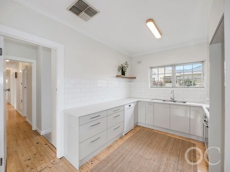 Open the Door to Classic Comfort Just Steps from the Coast - Photo 2
