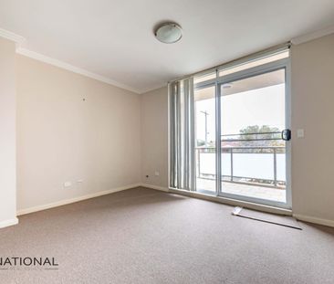 Two Bedroom Unit with Air Conditioning & Undercover Parking - Photo 2