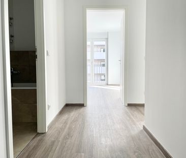 Neubau! 4-Zimmer-Wohnung mit Südbalkon, Einbauküche und Aufzug in R... - Foto 1