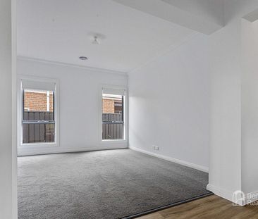 BEAUTIFULLY APPOINTED FOUR-BEDROOM FAMILY HOME WITH TWO LIVING AREAS - Photo 1
