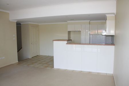 Modern Two-Storey Unit Moments from Flynns Beach - Photo 2