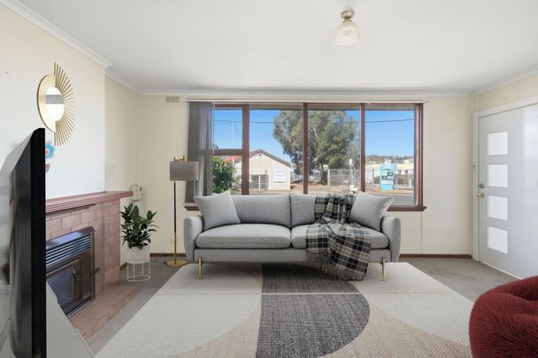 Neat & Practical Home with Secure Parking - Photo 1