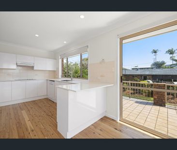 HIGH SET FOUR BEDROOM HOME WITH LAWN MAINTENANCE INCLUDED - Photo 1