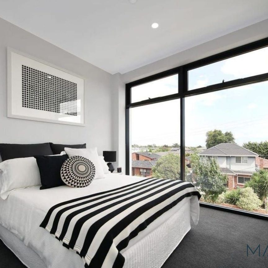 Modern Living in the McKinnon Secondary Zone - Photo 1