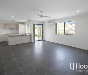Affordable Comfort in Prime Loganlea Location! - Photo 1