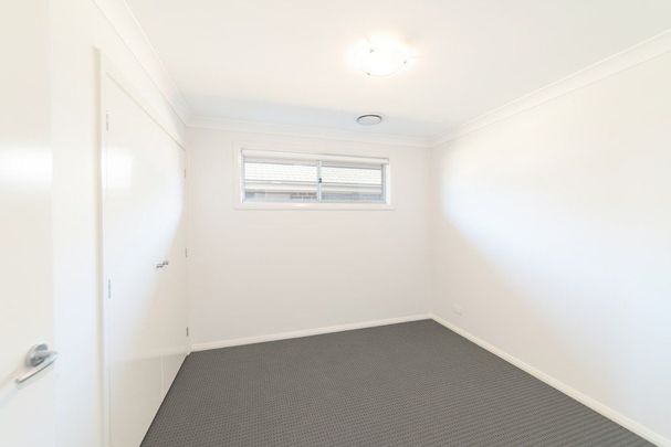 Family Home in the Heart of Chisholm - Photo 1