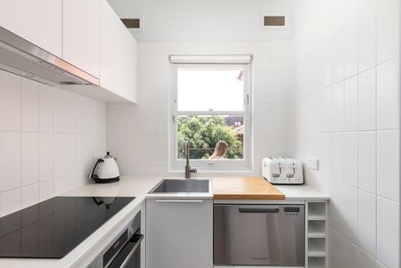 Stylishly Updated Apartment Offering Peace, Privacy & Prime Location - Photo 4