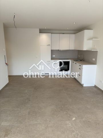 Exklusive Neubauwohnung im Erdgeschoss mit Garten - Photo 2