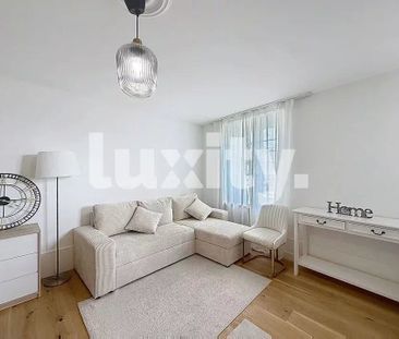 FOR RENT – EXCEPTIONAL APARTMENT IN THE HEART OF ROLLE, FACING THE ... - Photo 1