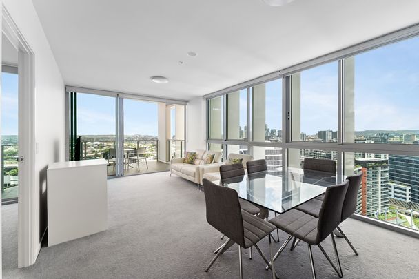 Top Floor Sky-High Living with City and River Views - Photo 1