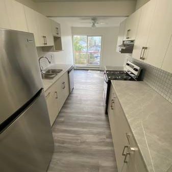 2 bedroom TOP FLOOR fully renovated suite!! Early move-in possible! - Photo 4