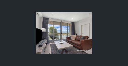 SPACIOUS TOP FLOOR APARTMENT WITH AMAZING VIEWS - Photo 3