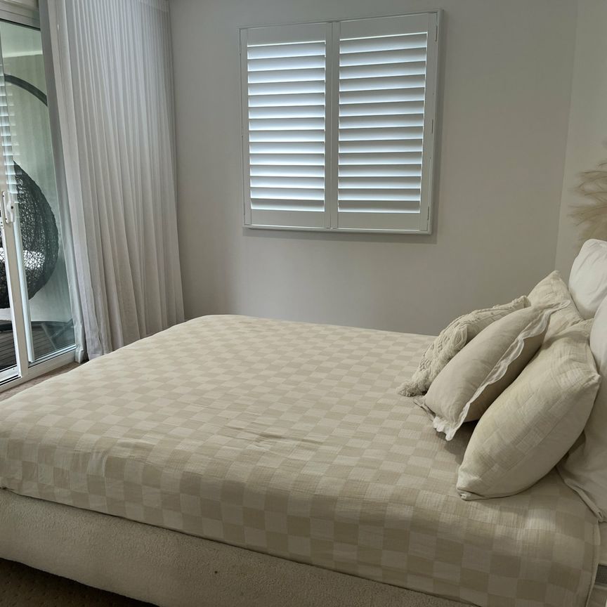 Beachside Living Awaits You In Bellara! - Photo 1