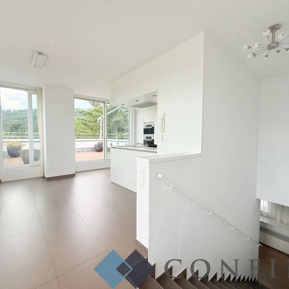 Exklusive Maisonette mit traumhaften Terrassen und unverbaubarem Grünblick in absoluter Ruhelage - Photo 1