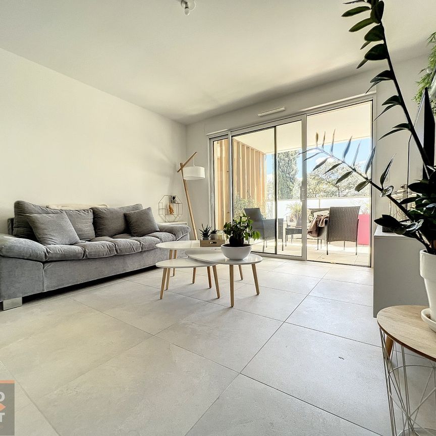 Location - Beau T2 en rez-de-chaussée avec grande terrasse et parking à Castries - Photo 1