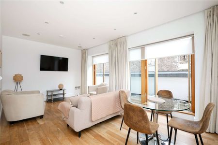 A spacious penthouse in central Putney. - Photo 2