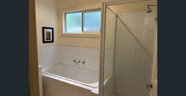 Convenient & Comfortable Living – Partially Furnished in a Beautiful Location - Photo 1