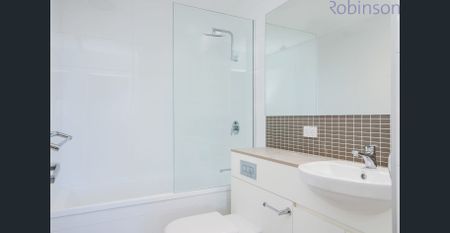 Two bedroom air-conditioned apartment in a central city location. Includes parking. - Photo 4