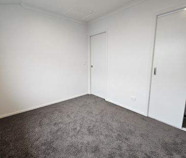 Brand new 2 bedroom duplex home, one off-street park, back from the... - Photo 2