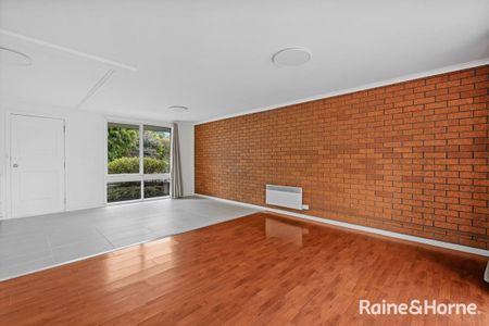 Conveniently Located & Freshly Updated Two-Bedroom Unit - Photo 4