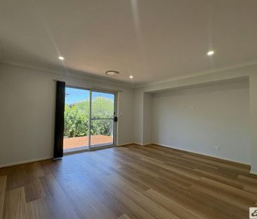 Spacious 4 Bedroom Home - Perfect For Families - Photo 1