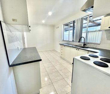 COSY 4 BEDROOM RENOVATED HOME - Photo 6