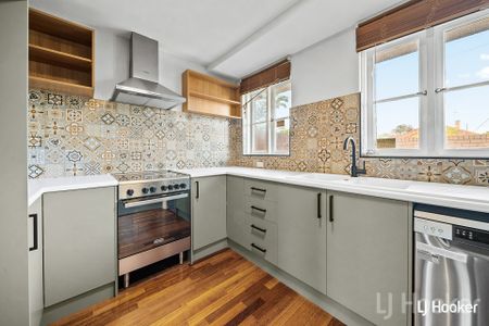 Fully Renovated Two-Bedroom Townhouse - Photo 3