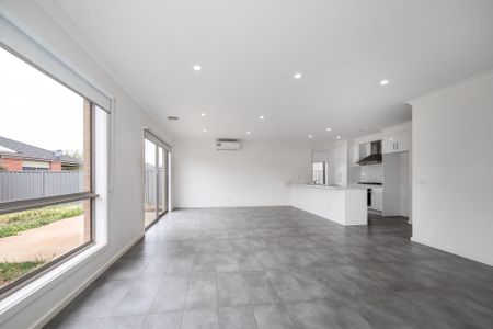 Sleek Style Meets Space: Contemporary Four-Bedroom Home in Highly Sought-After Weir Views - Photo 3
