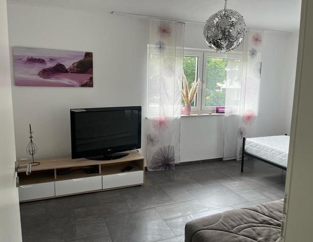 Schöne Wohnung mit Dachterrasse - Photo 1