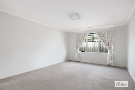 Spacious 4-Bedroom Family Home with Modern Comforts and Solar Power - Photo 3