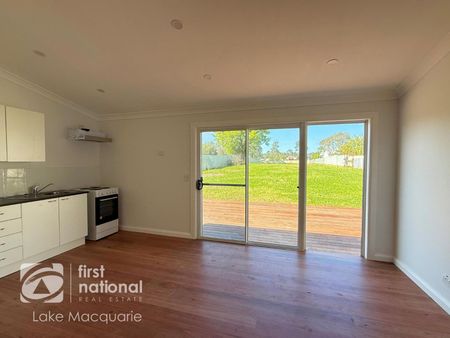 RENOVATED 2 BEDROOM UNIT - LAWN MAINTENANCE INCLUDED - Photo 3