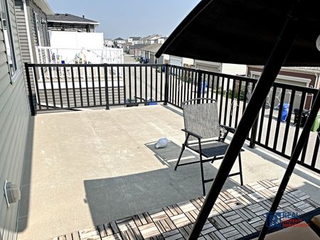 10799 Cityscape Drive NE | Townhouse | 3-bedroom, 2.5-bathroom | Double Garage - Photo 5