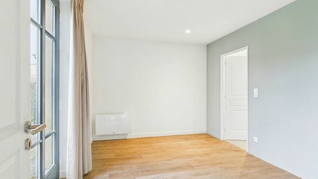 F2 neuf - jardin - parking - Photo 1