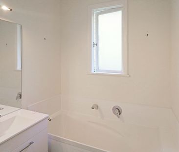 Sunny 3-Bedroom Home with Views in Island Bay - Photo 6