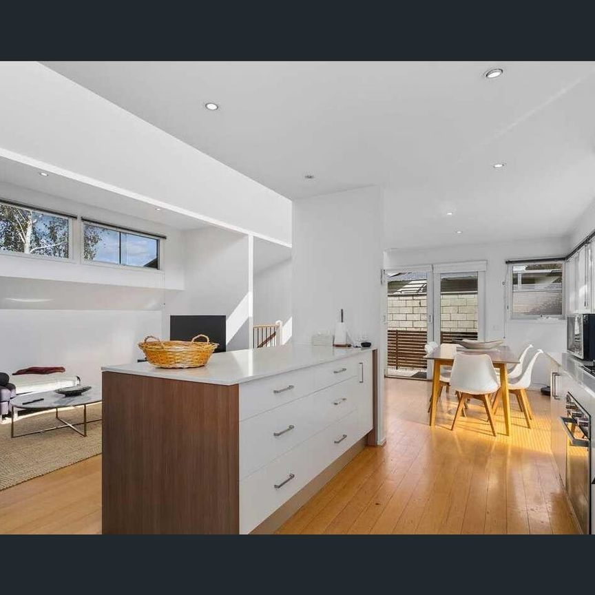 Stylish and Spacious Furnished Home with Private Garden and Modern Features - Photo 1