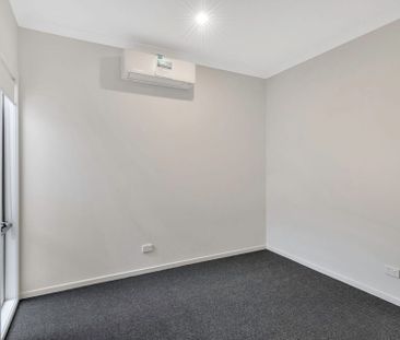 Beautifully Designed 4-Bedroom Family Home in Prime Location - Photo 6