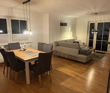 Helle EG-Wohnung mit Garten und Garage - Foto 1