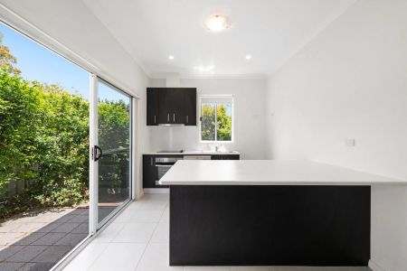 Modern Two-Bedroom Granny Flat with Spacious Deck & Second Living Area - Photo 3