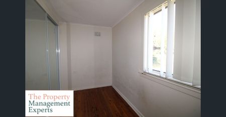 Tidy & Spacious 4-Bedroom Family Home in Miller - Photo 5