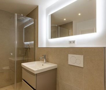 Erstbezug: 2-Zi-Gartenwohnung mit Einbauküche, 2 Terrassen und TG-E... - Photo 5