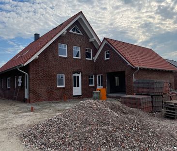 Neubauwohnung im Erdgeschoss mit großer Garage und Garten - Foto 3