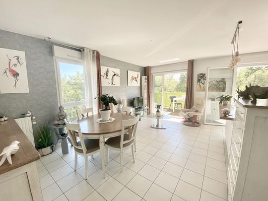 APPARTEMENT DE 80 M2 AVEC BALCON - GARAGE ET STATIONNEMENT - Photo 1