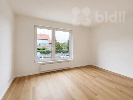 Pronájem novostavby 2+KK 52 m² s balkónem 5 m², ul. Hodkovická, Praha - Fotografie 1