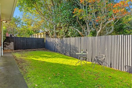 🌞 Sunny, North-Facing Brick & Tile Home - Photo 4